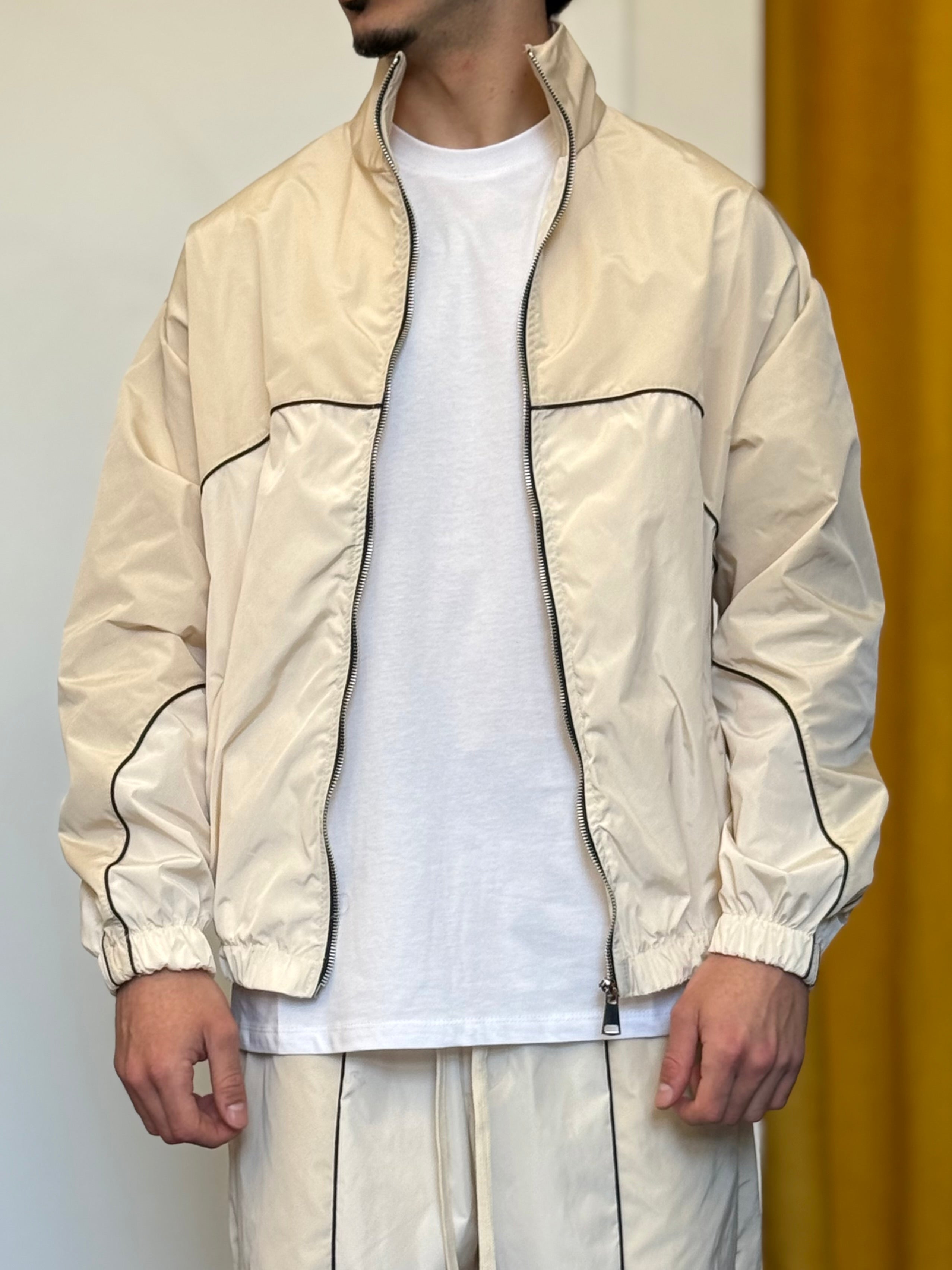 TUTA PRIMAVERA Tessuto Tecnico PANNA